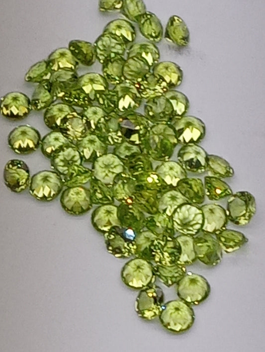 peridot gemstones, 4mm round cut average, 71 stones, 19.84ctw