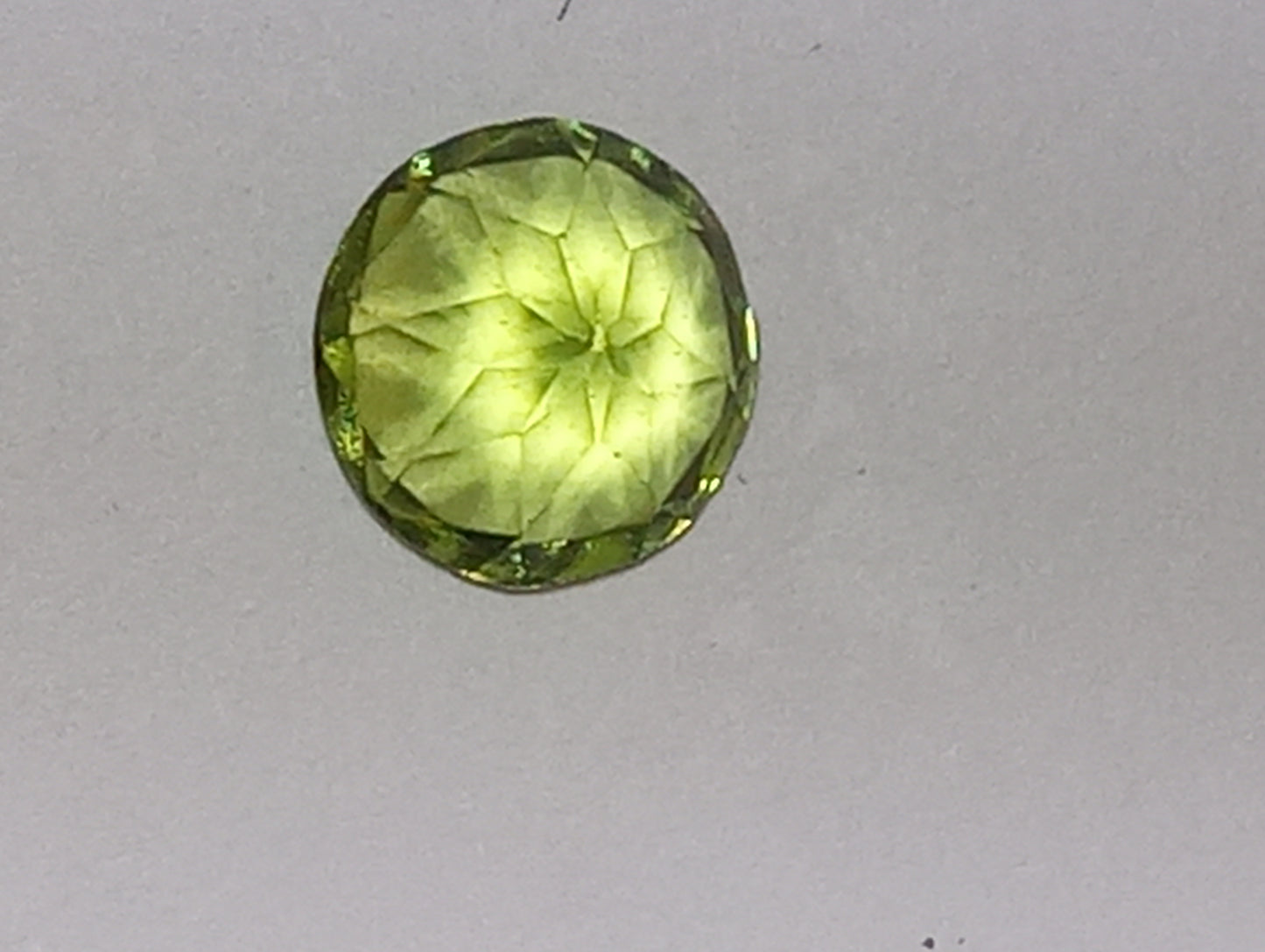 peridot gemstone, 6mm round cut, .97ct