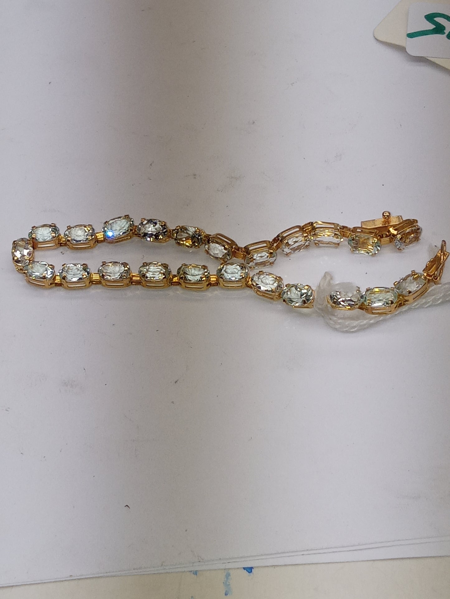 bracelet light aquamarine in 14k yellow gold, 6mmx4mm oval cut stones
