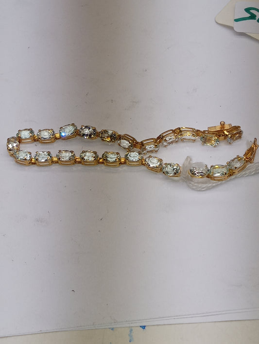 bracelet light aquamarine in 14k yellow gold, 6mmx4mm oval cut stones