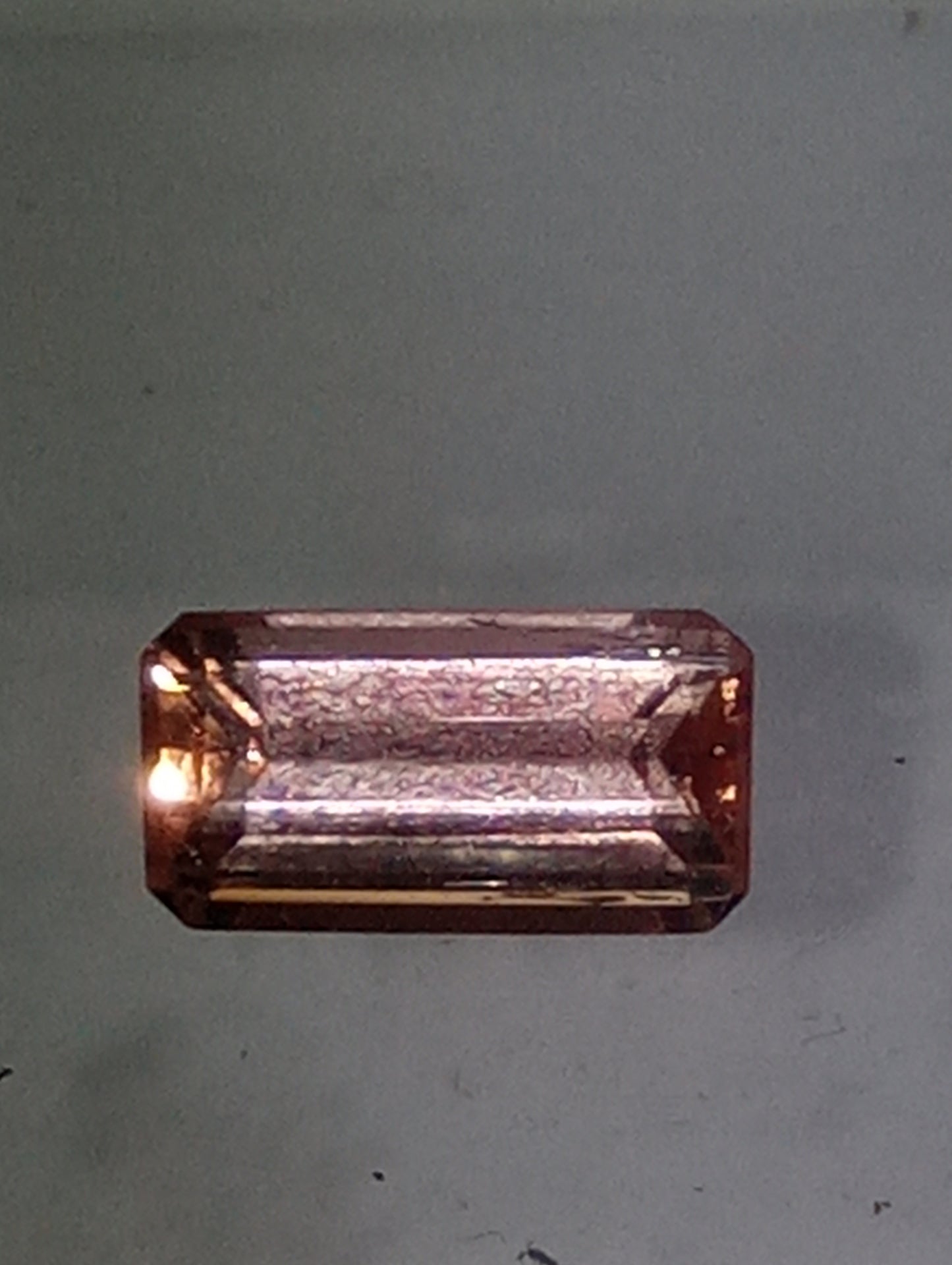 topaz gemstone Imperial, peachy pink,  7mmx4mm bagette cut, .81ct